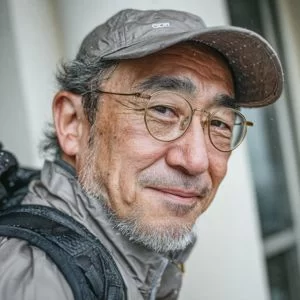 長岡市古市場周辺のゴルフ場で、ゴルフウェア姿の60代男性ゴルファーがバストアップで穏やかに写っている様子